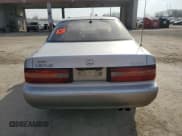✅ 1995 Lexus ES 300 • VIN: JT8GK13T4S0106988 • Lot: 48796715. Wystawiony na Copart z przebiegiem Nie podano. Bezpłatny archiwum sprzedaży aukcyjnych z USA i szczegółowy raport historii pojazdu na DreamBid. Zdjęcie 6.