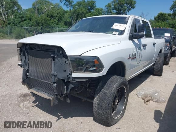 ✅ 2018 Ram 2500 Tradesman • VIN: 3C6UR5CL2JG283449 • Lot: 42113371. Listed on IAAI with 127,352 mi. Free auction sales archive from the USA and detailed vehicle history report at DreamBid. Image 2.