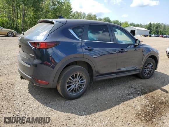 ✅ 2021 Mazda CX-5 Touring • VIN: JM3KFACM7M0113548 • Лот: 66671995. Опубликован ранее на Copart с пробегом 75 399 миль. Бесплатный доступ к архиву аукционных продаж из США и подробный отчёт об истории автомобиля на DreamBid. Изображение 3.