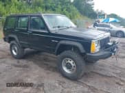 ✅ 1987 Jeep Cherokee • VIN: 1JCMR7819HT174249 • Lot: 42458110. Listed on IAAI with 157,683 mi. Free auction sales archive from the USA and detailed vehicle history report at DreamBid. Image 1.