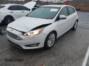 ✅ 2018 Ford Focus Titanium • VIN: 1FADP3N25JL278889 • Лот: 43693208. Опубликован ранее на IAAI с пробегом 79 661 миль. Бесплатный доступ к архиву аукционных продаж из США и подробный отчёт об истории автомобиля на DreamBid. Изображение 2.