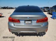 ✅ 2018 BMW M5 • VIN: WBSJF0C55JB282449 • Lot: 60221525. Listed on Copart with 22,112 mi. Free auction sales archive from the USA and detailed vehicle history report at DreamBid. Image 6.