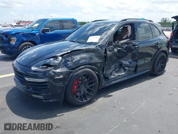 ✅ 2016 Porsche Cayenne GTS • VIN: WP1AD2A25GLA70430 • Lot: 42547008. Listed on IAAI with 108,374 mi. Free auction sales archive from the USA and detailed vehicle history report at DreamBid. Image 2.