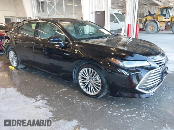 ✅ 2020 Toyota Avalon Limited Hybrid • VIN: 4T1D21FB8LU018667 • Lot: 40933475. Wystawiony na IAAI z przebiegiem 89 018 mil. Bezpłatny archiwum sprzedaży aukcyjnych z USA i szczegółowy raport historii pojazdu na DreamBid. Zdjęcie 1.