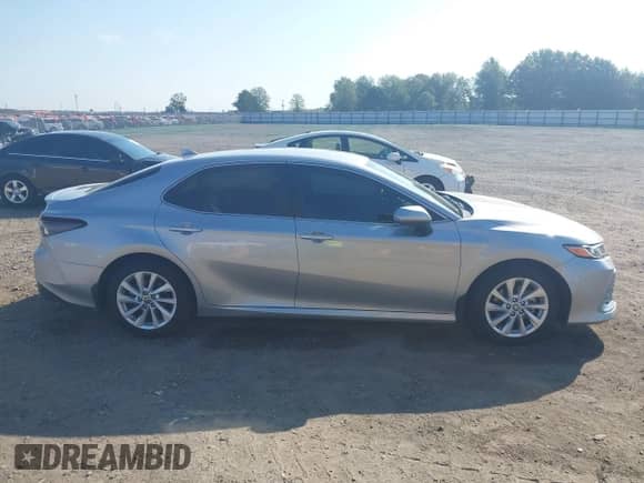 2023 Toyota Camry LE z VIN 4T1C11AK4PU147534, wystawiony jako IAAI lot #43337127 z przebiegiem 11 969 mil mil oraz . Historia ofert i sprzedaży dostępna na DreamBid. Obrazek 13.
