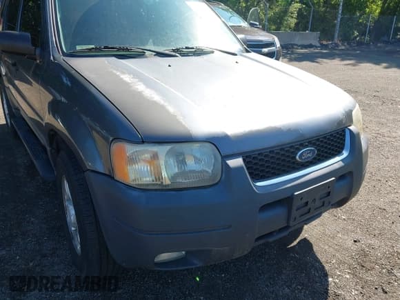 ✅ 2004 Ford Escape XLT • VIN: 1FMCU031X4DA18148 • Lot: 42566498. Listed on IAAI with 264,092 mi. Free auction sales archive from the USA and detailed vehicle history report at DreamBid. Image 6.