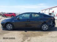 ✅ 2021 Toyota Prius LE • VIN: JTDKAMFP5M3187029 • Lot: 41985248. Wystawiony na IAAI z przebiegiem 16 419 mil. Bezpłatny archiwum sprzedaży aukcyjnych z USA i szczegółowy raport historii pojazdu na DreamBid. Zdjęcie 14.