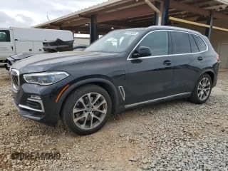 ✅ 2021 BMW X5 xDrive45e • VIN: 5UXTA6C04M9H58063 • Лот: 53128655. Опубликован ранее на Copart с пробегом 56 558 миль. Бесплатный доступ к архиву аукционных продаж из США и подробный отчёт об истории автомобиля на DreamBid. Изображение 1.