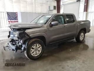 2022 Nissan Frontier SV with VIN 1N6ED1EK5NN651688, listed as a Copart auction lot 58927845 with 20,848 mi miles and Salvage title. Bid and sale history available at DreamBid. Image 1.