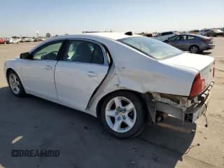 ✅ 2012 Chevrolet Malibu 1LS • VIN: 1G1ZB5E08CF317851 • Lot: 72824324. Listed on Copart with 186,498 mi. Free auction sales archive from the USA and detailed vehicle history report at DreamBid. Image 2.