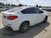 ✅ 2018 BMW X4 M40i • VIN: 5UXXW7C57J0W63952 • Лот: 47435363. Опубликован ранее на Copart с пробегом 67 198 миль. Бесплатный доступ к архиву аукционных продаж из США и подробный отчёт об истории автомобиля на DreamBid. Изображение 3.