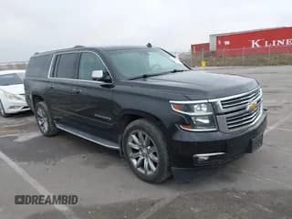 ✅ 2015 Chevrolet Suburban LTZ • VIN: 1GNSKKKC9FR141554 • Lot: 43689201. Listed on IAAI with 201,479 mi. Free auction sales archive from the USA and detailed vehicle history report at DreamBid. Image 1.