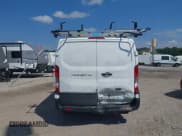 ✅ 2021 Ford Transit Cargo • VIN: 1FTYE1Y80MKA75151 • Lot: 42577609. Listed on IAAI with 91,623 mi. Free auction sales archive from the USA and detailed vehicle history report at DreamBid. Image 16.