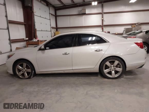 ✅ 2015 Chevrolet Malibu LTZ • VIN: 1G11G5SX1FF128902 • Lot: 43594997. Listed on IAAI with 105,886 mi. Free auction sales archive from the USA and detailed vehicle history report at DreamBid. Image 14.
