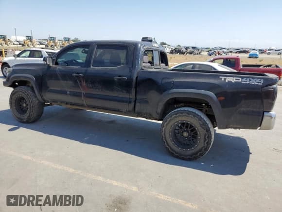 ✅ 2016 Toyota Tacoma SR5 • VIN: 3TMDZ5BNXGM011611 • Lot: 68022835. Listed on Copart with 141,729 mi. Free auction sales archive from the USA and detailed vehicle history report at DreamBid. Image 2.