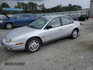 2002 Saturn SL с VIN 1G8ZK52702Z264191, выставлен на аукционе Copart как лот 70042825 с пробегом 118 826 миль миль и Списание • Salvage title. История ставок и продаж доступна на DreamBid. Изображение 1.