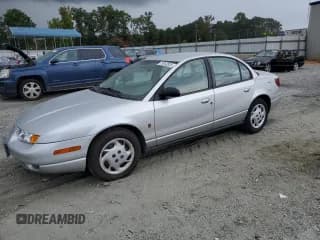 ✅ 2002 Saturn SL • VIN: 1G8ZK52702Z264191 • Lot: 70042825. Listed on Copart with 118,826 mi. Free auction sales archive from the USA and detailed vehicle history report at DreamBid. Image 1.