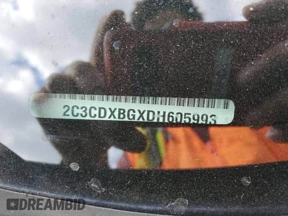 2013 Dodge Charger SE with VIN 2C3CDXBGXDH605993, listed as a Copart auction lot 86324205 with 138,261 mi miles and Clean title. Bid and sale history available at DreamBid. Image 12.