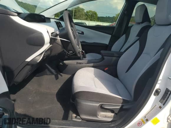 2021 Toyota Prius L Eco with VIN JTDKAMFU9M3139796, listed as a Copart auction lot 71665595 with 89,976 mi miles and Salvage title. Bid and sale history available at DreamBid. Image 7.