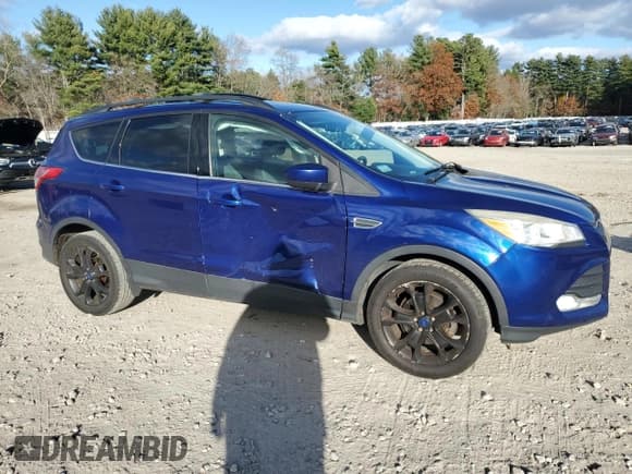✅ 2014 Ford Escape SE • VIN: 1FMCU0GX6EUD04093 • Lot: 93028735. Listed on Copart with 100,790 mi. Free auction sales archive from the USA and detailed vehicle history report at DreamBid. Image 4.