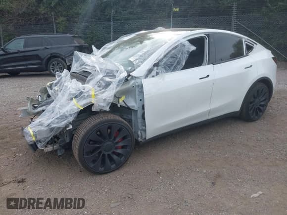 ✅ 2022 Tesla Model Y Long Range • VIN: 7SAYGAEEXNF515060 • Lot: 43556257. Wystawiony na IAAI z przebiegiem 91 271 mil. Bezpłatny archiwum sprzedaży aukcyjnych z USA i szczegółowy raport historii pojazdu na DreamBid. Zdjęcie 2.