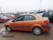 ✅ 2009 Kia Rio LX • VIN: KNADE223596580617 • Lot: 43727560. Wystawiony na IAAI z przebiegiem 243 386 mil. Bezpłatny archiwum sprzedaży aukcyjnych z USA i szczegółowy raport historii pojazdu na DreamBid. Zdjęcie 13.