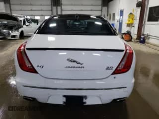 ✅ 2015 Jaguar XJ • VIN: SAJWJ1CD3F8V89374 • Lot: 49416114. Listed on Copart with 94,636 mi. Free auction sales archive from the USA and detailed vehicle history report at DreamBid. Image 6.