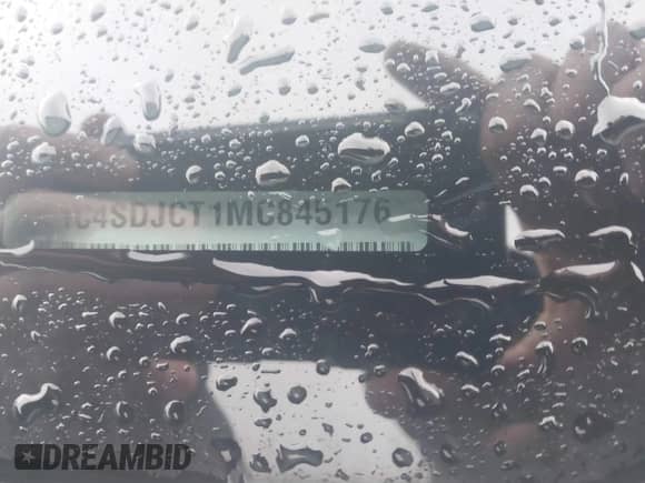 2021 Dodge Durango R/T with VIN 1C4SDJCT1MC845176, listed as a IAAI auction lot 41941801 with 54,781 mi miles and . Bid and sale history available at DreamBid. Image 9.