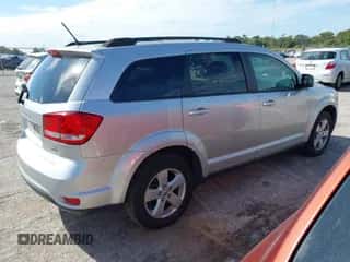 2012 Dodge Journey SXT с VIN 3C4PDCBG4CT208047, выставлен на аукционе IAAI как лот 43545270 с пробегом 123 654 миль миль и . История ставок и продаж доступна на DreamBid. Изображение 4.