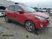 2014 Hyundai Tucson Limited z VIN KM8JUCAG1EU861608, wystawiony jako Copart lot #69047105 z przebiegiem 112 989 mil mil oraz Szkoda całkowita • Salvage title. Historia ofert i sprzedaży dostępna na DreamBid. Obrazek 4.