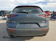 ✅ 2020 Mazda CX-30 Premium • VIN: 3MVDMAEMXLM125319 • Lot: 57896985. Wystawiony na Copart z przebiegiem 117 692 mil. Bezpłatny archiwum sprzedaży aukcyjnych z USA i szczegółowy raport historii pojazdu na DreamBid. Zdjęcie 6.