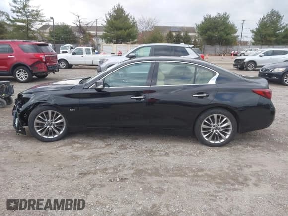 ✅ 2019 Infiniti Q50 Luxe • VIN: JN1EV7AR1KM553798 • Lot: 43673507. Listed on IAAI with 105,444 mi. Free auction sales archive from the USA and detailed vehicle history report at DreamBid. Image 14.