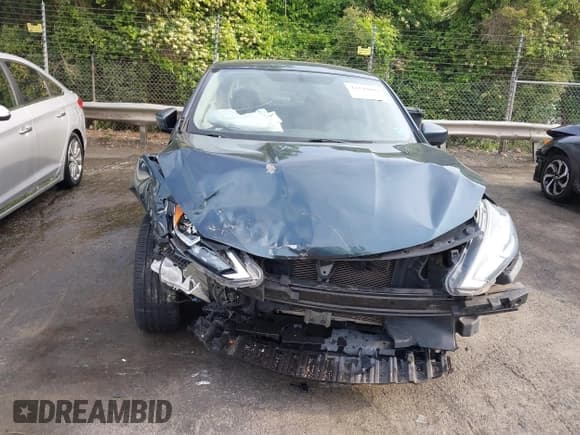 ✅ 2017 Nissan Sentra SL • VIN: 3N1AB7AP1HY326218 • Lot: 42149603. Listed on IAAI with 87,429 mi. Free auction sales archive from the USA and detailed vehicle history report at DreamBid. Image 12.