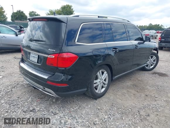 ✅ 2014 Mercedes-Benz GL 450 • VIN: 4JGDF7CE4EA404979 • Лот: 43091221. Опубликован ранее на IAAI с пробегом 132 870 миль. Бесплатный доступ к архиву аукционных продаж из США и подробный отчёт об истории автомобиля на DreamBid. Изображение 4.