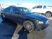 ✅ 2008 Dodge Charger SXT • VIN: 2B3KA33G08H108398 • Lot: 43694032. Listed on IAAI with 189,985 mi. Free auction sales archive from the USA and detailed vehicle history report at DreamBid. Image 1.