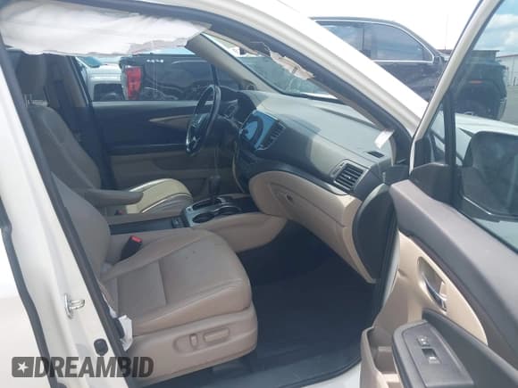 ✅ 2019 Honda Pilot EX-L • VIN: 5FNYF5H51KB008630 • Lot: 42966581. Listed on IAAI with 182,416 mi. Free auction sales archive from the USA and detailed vehicle history report at DreamBid. Image 5.