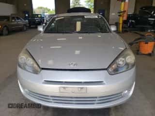 2007 Hyundai Tiburon GS с VIN KMHHM66D37U253610, выставлен на аукционе Copart как лот 62200825 с пробегом 107 500 миль миль и Списание • Salvage title. История ставок и продаж доступна на DreamBid. Изображение 5.