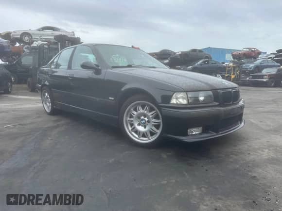 1998 BMW 3 Series M3s with VIN WBSCD9325WEE09458, listed as a Copart auction lot 48253425 with 254,162 mi miles and Clean title. Bid and sale history available at DreamBid. Image 1.