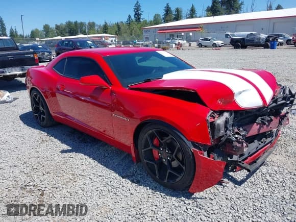 ✅ 2013 Chevrolet Camaro LS • VIN: 2G1FE1E35D9174624 • Lot: 42685585. Listed on IAAI with 83,627 mi. Free auction sales archive from the USA and detailed vehicle history report at DreamBid. Image 1.