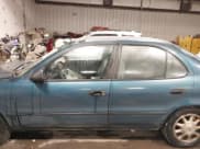 ✅ 1994 Geo Prizm • VIN: 1Y1SK5380RZ081863 • Lot: 41489263. Listed on IAAI with 124,256 mi. Free auction sales archive from the USA and detailed vehicle history report at DreamBid. Image 14.