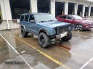 ✅ 1999 Jeep Cherokee Sport • VIN: 1J4FF68S4XL583029 • Lot: 52030175. Listed on Copart with 294,502 mi. Free auction sales archive from the USA and detailed vehicle history report at DreamBid. Image 12.