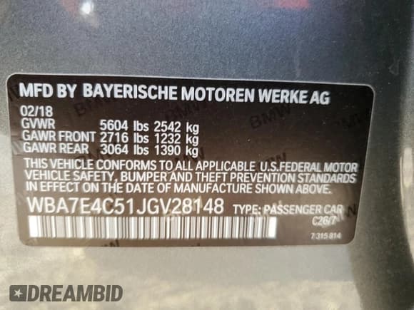 ✅ 2018 BMW 7 Series 740i xDrive • VIN: WBA7E4C51JGV28148 • Лот: 79973164. Опубликован ранее на Copart с пробегом 103 759 миль. Бесплатный доступ к архиву аукционных продаж из США и подробный отчёт об истории автомобиля на DreamBid. Изображение 13.