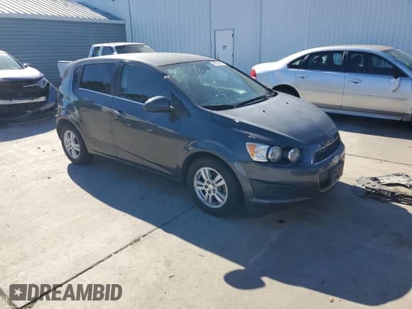 2013 Chevrolet Sonic LT with VIN 1G1JC6SG6D4230173, listed as a Copart auction lot 82782885 with 190,906 mi miles and Salvage title. Bid and sale history available at DreamBid. Image 4.