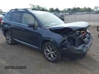 2016 Subaru Forester Touring with VIN JF2SJAVC3GH437843, listed as a IAAI auction lot 43295464 with 204,260 mi miles and . Bid and sale history available at DreamBid. Image 1.