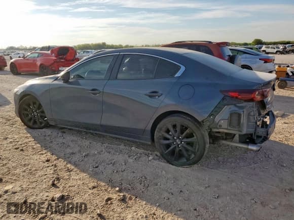✅ 2024 Mazda 3 S Carbon Edition • VIN: 3MZBPBCMXRM417700 • Lot: 81881145. Listed on Copart with 17,506 mi. Free auction sales archive from the USA and detailed vehicle history report at DreamBid. Image 2.