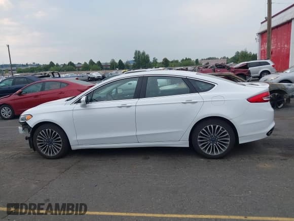 ✅ 2018 Ford Fusion Titanium • VIN: 3FA6P0D90JR234225 • Lot: 43134139. Listed on IAAI with 92,932 mi. Free auction sales archive from the USA and detailed vehicle history report at DreamBid. Image 15.