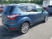 ✅ 2018 Ford Escape Titanium • VIN: 1FMCU9J92JUB01162 • Lot: 42495112. Listed on IAAI with 96,280 mi. Free auction sales archive from the USA and detailed vehicle history report at DreamBid. Image 4.