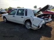 ✅ 1996 Lincoln Town Car Signature • VIN: 1LNLM82W8TY716793 • Лот: 61576205. Опубликован ранее на Copart с пробегом 58 604 миль. Бесплатный доступ к архиву аукционных продаж из США и подробный отчёт об истории автомобиля на DreamBid. Изображение 2.