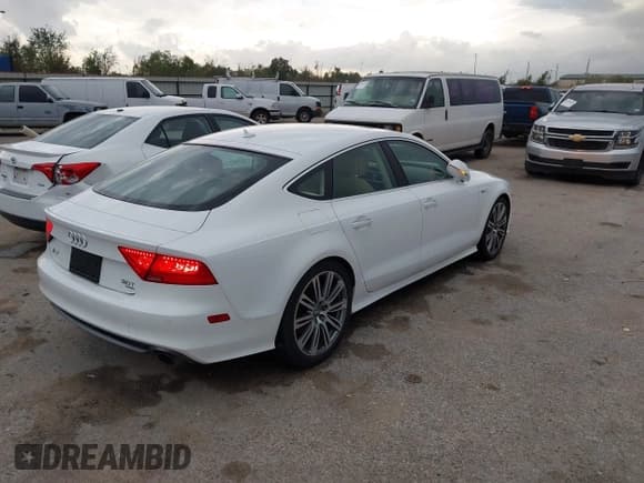 ✅ 2014 Audi A7 Prestige • VIN: WAU2GAFC1EN059769 • Лот: 43778932. Опубликован ранее на IAAI с пробегом 183 189 миль. Бесплатный доступ к архиву аукционных продаж из США и подробный отчёт об истории автомобиля на DreamBid. Изображение 4.
