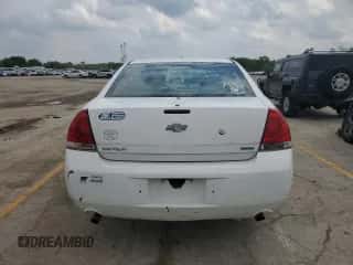 2014 Chevrolet Impala Police Police with VIN 2G1WD5E34E1126347, listed as a Copart auction lot 58949635 with 239,628 mi miles and Salvage title. Bid and sale history available at DreamBid. Image 6.